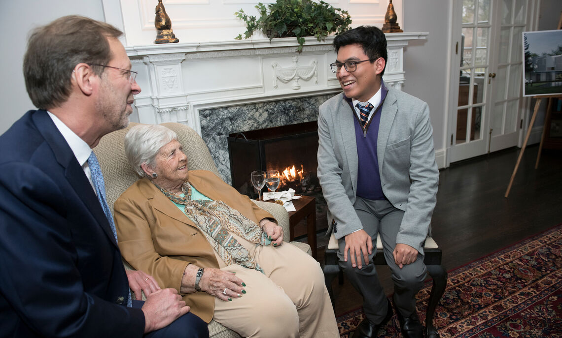 Daniel R. Porterfield, former F&M president, speaks to Ann Barshinger and Roger Avila-Vidal '22.