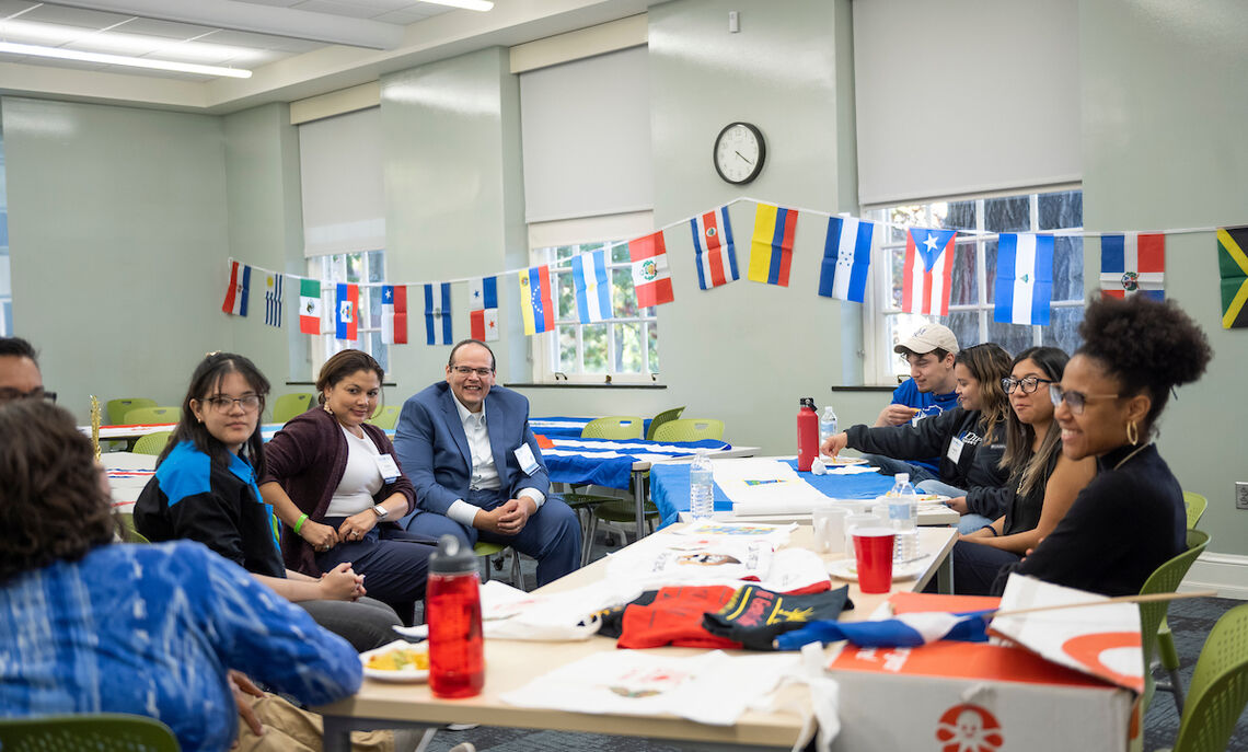 Students, parents and alumni gather for Coffee Hour at the Joseph International Center.