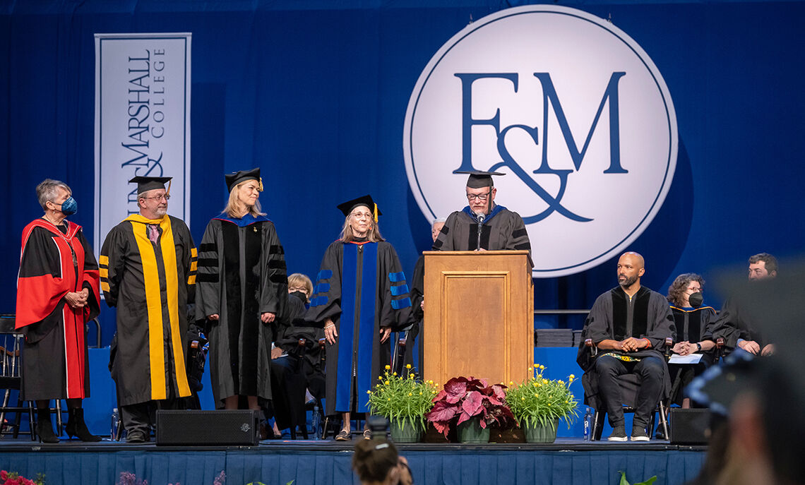F&M Provost Cameron Wesson greets the Class of 2022, flanked by award-winning members of the F&M faculty. They are, from left of Wesson, Carol de Wet, Jennifer Redmann and Kenneth R. Hess.