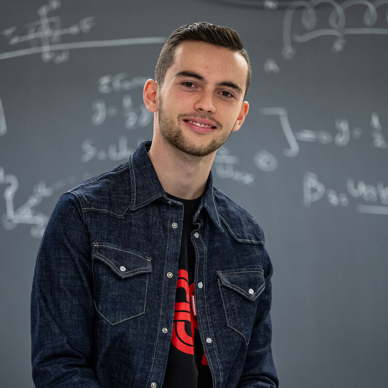 Menelaos Raptis '26 shown in Hackman Physical Sciences Laboratories.
