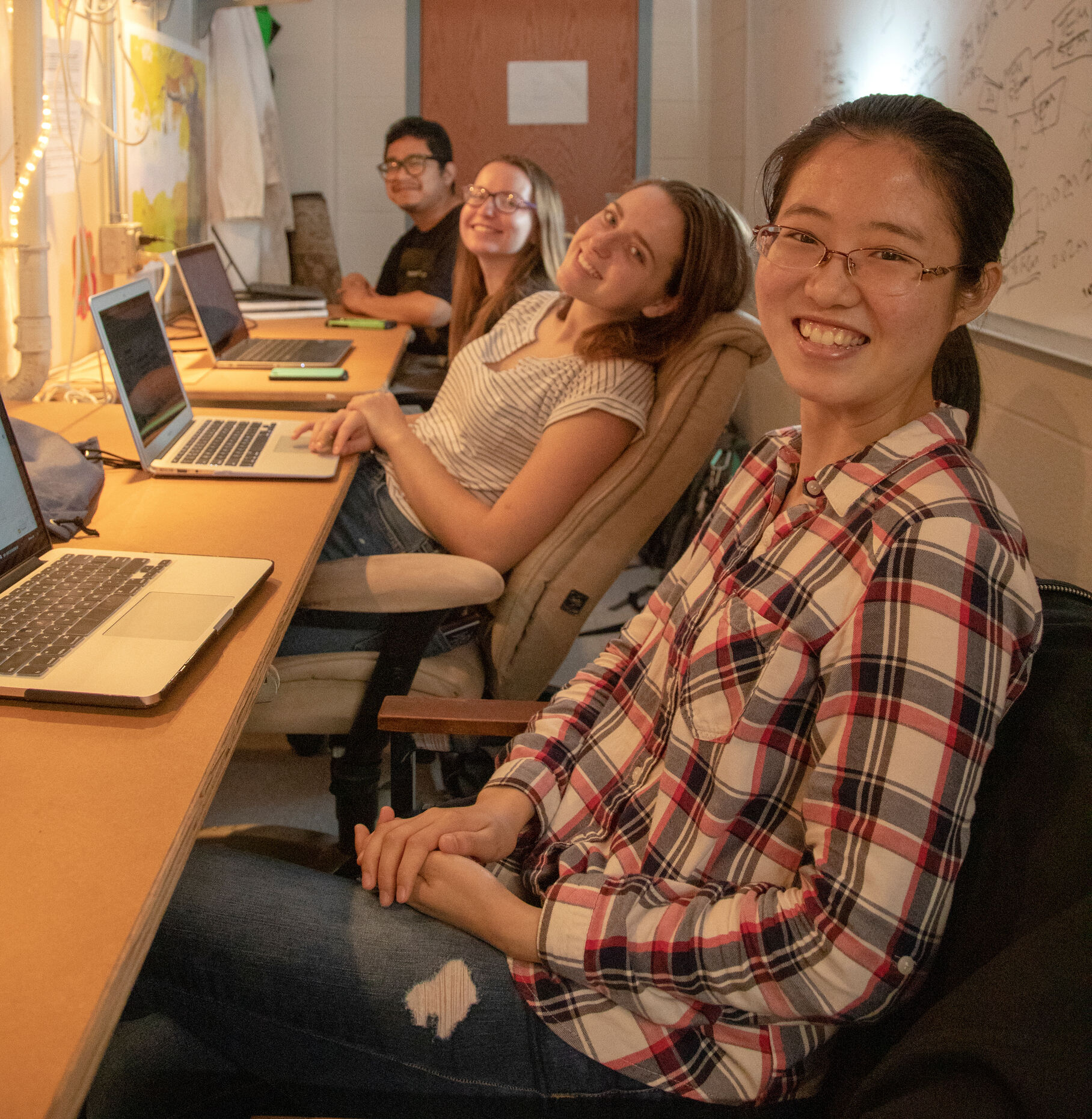 Senior Huiyan Anna Xiong with classmates