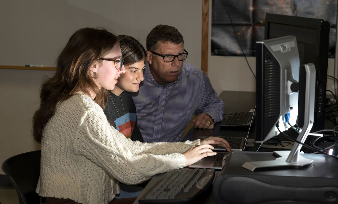Sophomore Mckenzie Golden, senior astrophysics major Mia Gironda, and Professor of Physics and Astronomy Fronefield Crawford search decades old observatory data for pulsars.
