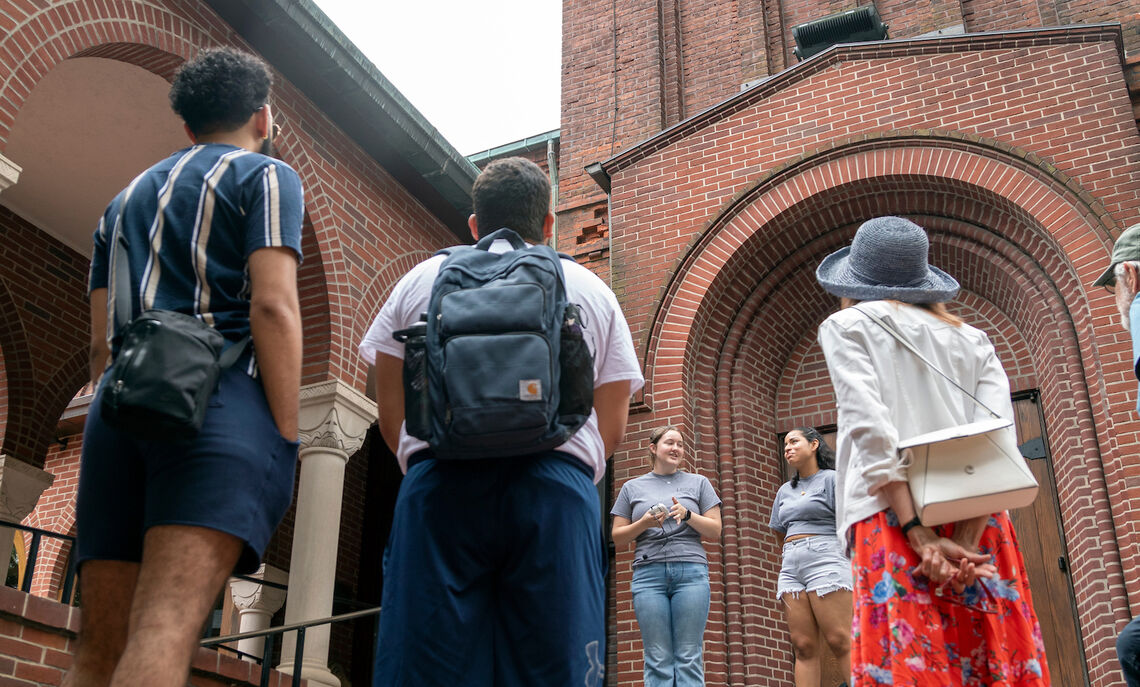 Lauren Sphar '23 guides a tour of Lancaster Vice History. The tour begins on the steps of St. James Episcopal Church in downtown Lancaster,