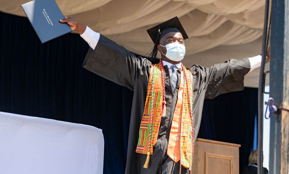 Members of the Class of 2021 receive their diplomas during F&M Commencement held May 15 at Lancaster Clipper Stadium.