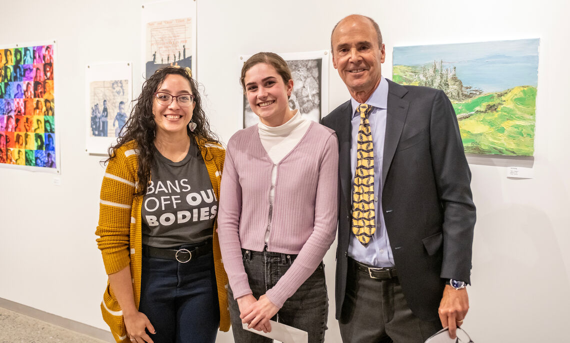 Winter72 Student Art Show exhibition judge Salina Mayloni Almanzar-Oree '13, grand prize winner Therese Watkins '23 and Doug Winter '72.