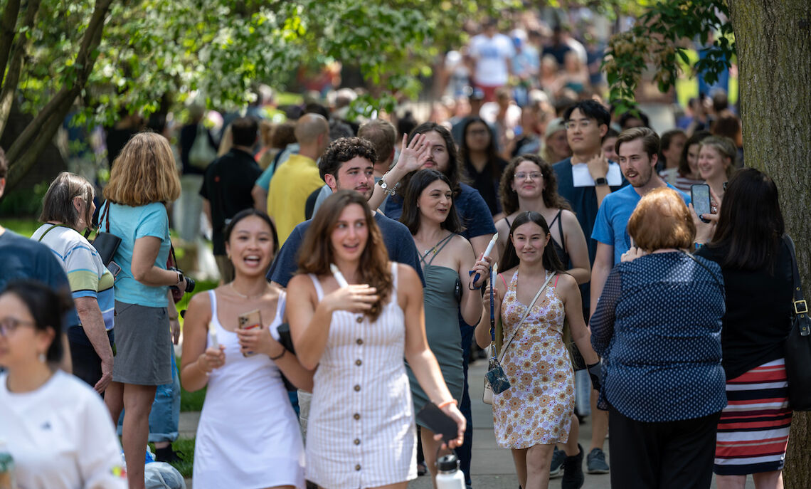 Graduating seniors take a final stroll through campus as members of the Franklin & Marshall community join them to celebrate their four years of achievement.