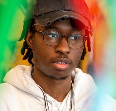 "It's talking about craft with others that brings a bit more warmth to my writing experience," says  Idris /Izzy Mansaray '23.