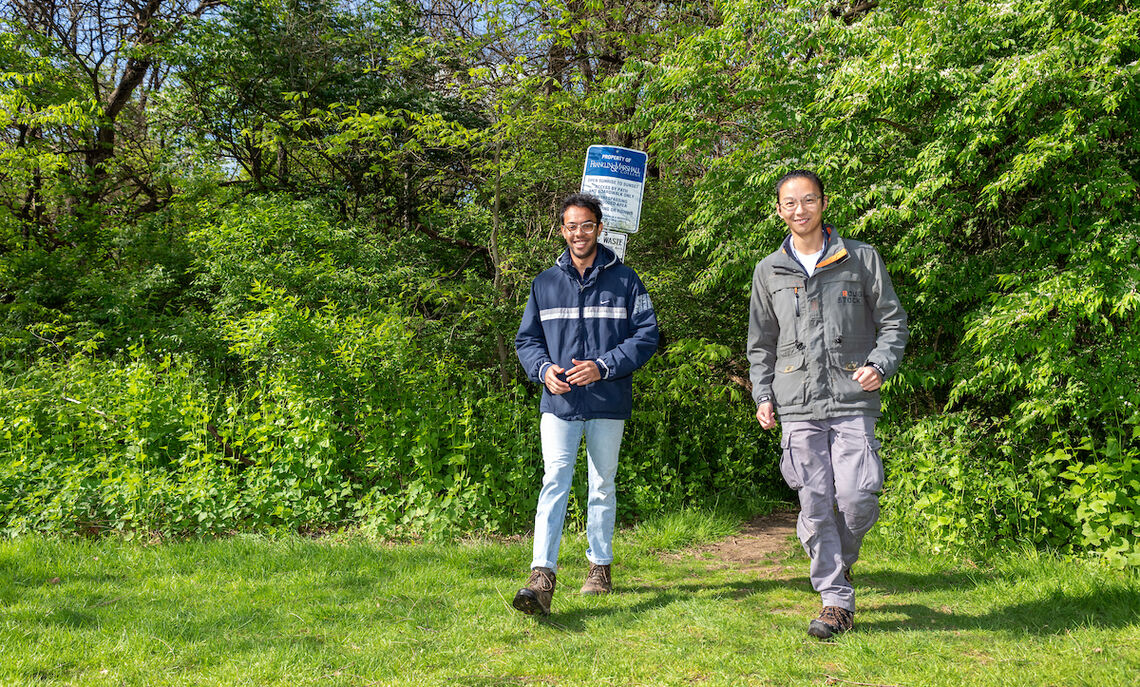 Vyas Agarwal '23 (left) and William Li  '23 exit the Spalding Conservancy trails.