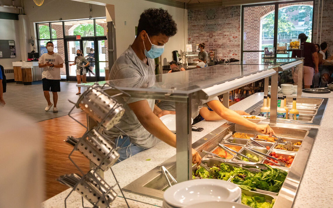 Students dig into the expanded salad bar at the Mongolian Grill station.
