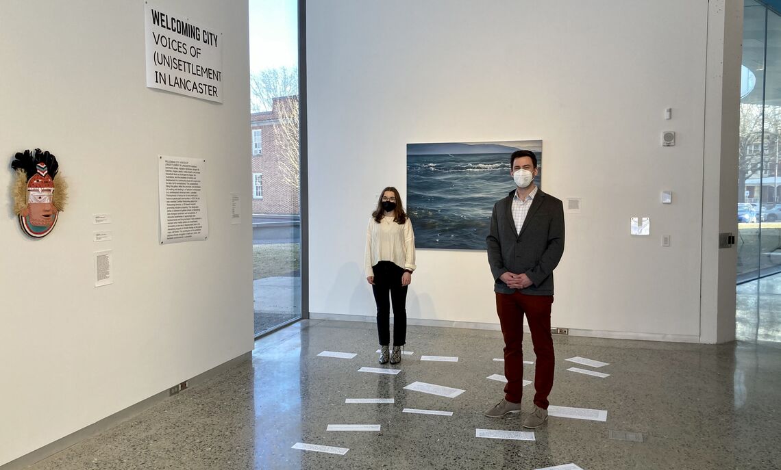 ... Jacobs with Professor Eric Hirsch, co-curator of the exhibit with research partner, Amer Al-Fayadh, CEO of Communications Essentials.