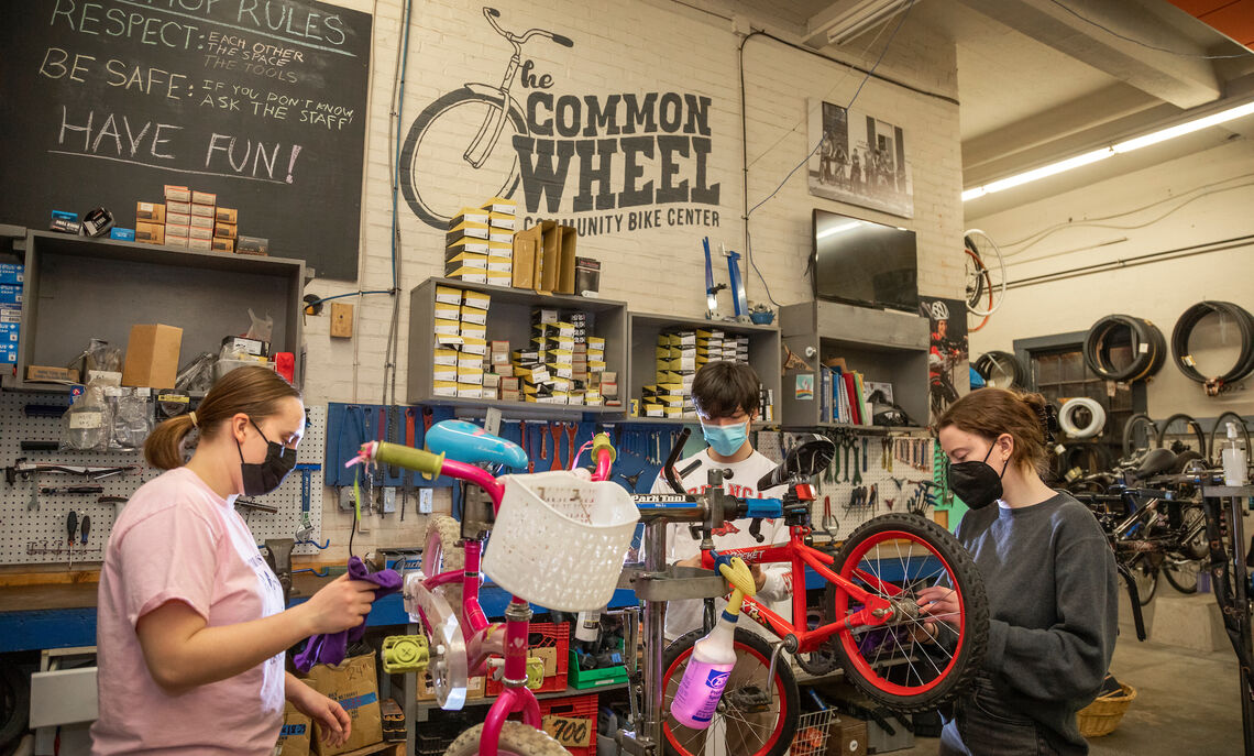 03 02... Students volunteer at The Common Wheel on Wednesday evenings during the spring semester. Each year, the nonprofit collects and refurbishes bikes to donate to Lancaster youth.