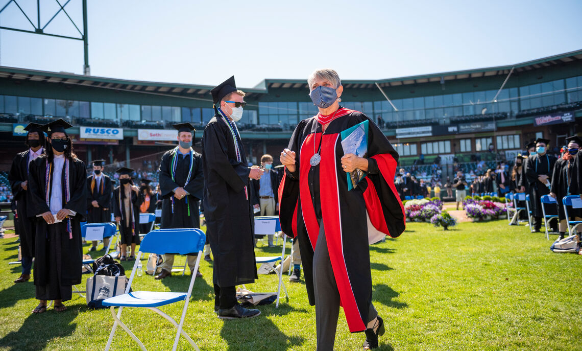 ... F&M President Barbara Altmann makes her way to the podium during F&M Commencement held May 15 at Lancaster Clipper Stadium.