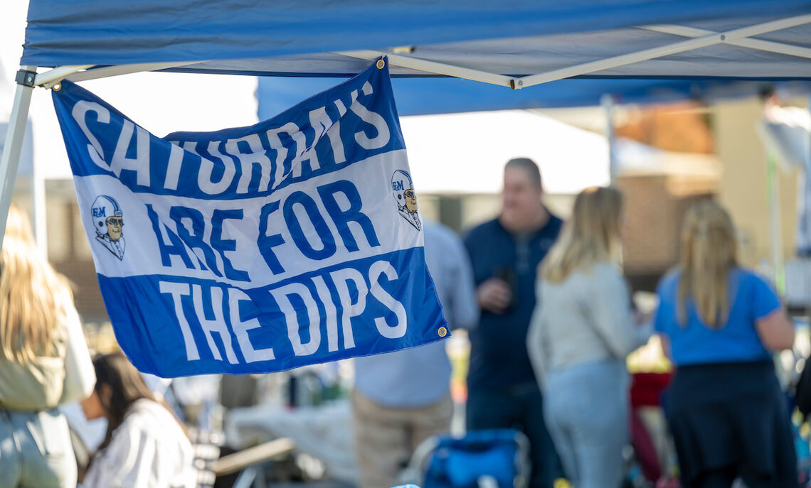 True... Diplomat athletes and fans gathered for a tailgate outside Shadek Stadium.
