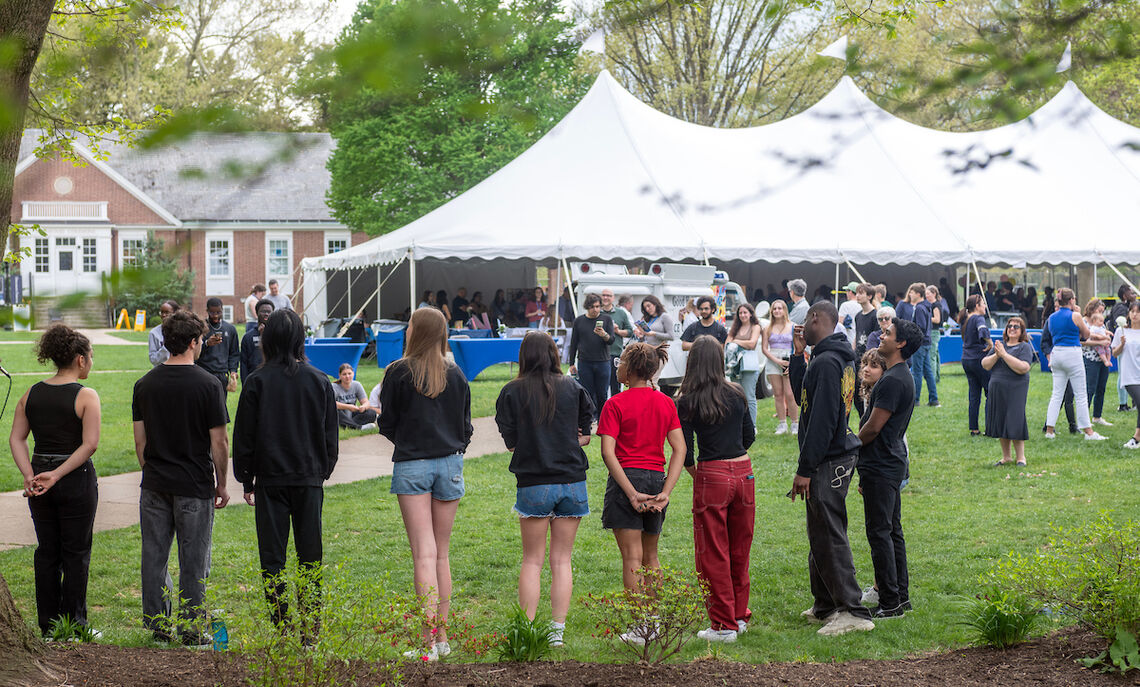 04 15... An a cappella performance on Hartman Green during Admitted Student Weekend.