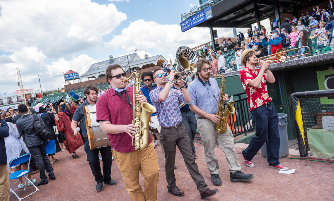 Big... In a festive ceremony finale, Big Boy Brass music ensemble plays at F&M 2021 Commencement held May 15 at Clipper Stadium.