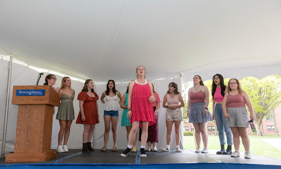 04 14... An a cappella performance on Hartman Green during Admitted Student Weekend.