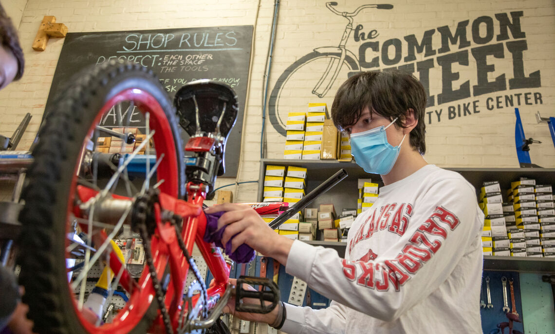 03 02... Students volunteer at The Common Wheel on Wednesday evenings during the spring semester. Each year, the nonprofit collects and refurbishes bikes to donate to Lancaster youth.