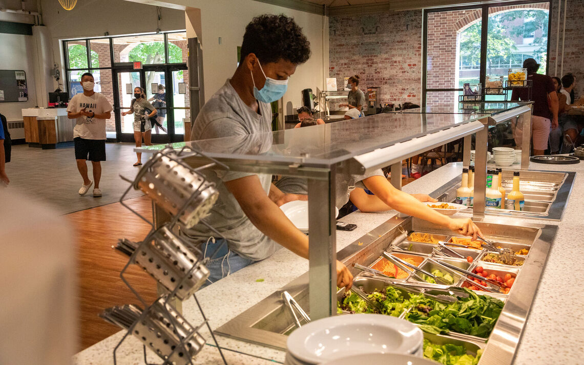 08 25... Students dig into the expanded salad bar at the Mongolian Grill station.